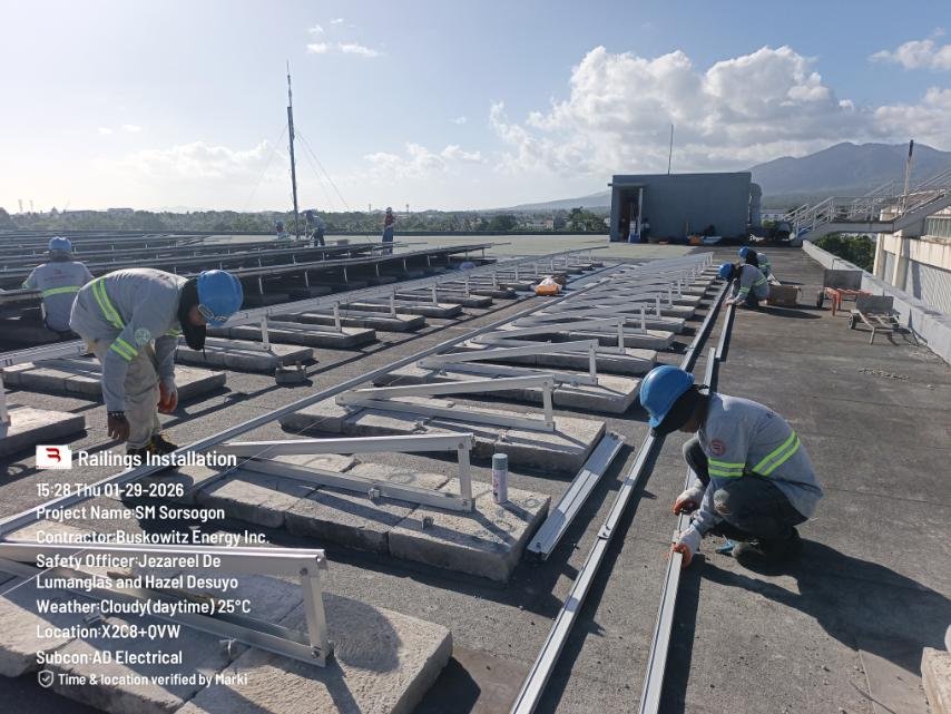 AD Electrical crew installing solar mounting rails at SM Sorsogon